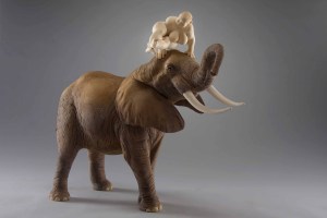 "dancing down an elephant", limewood, acrilic colors, 72cm, 2012