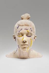 its there in your expression / 63 x 57 x 52 cm / limewood, fabric / 2022