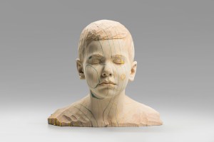 Mind full of dreams (Daniel) 26 x 29 x 20 cm limewood, cotton fabric 2023