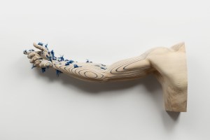 metamorphosis 32 x 75 x 14 cm limewood, cotton fabric 2023